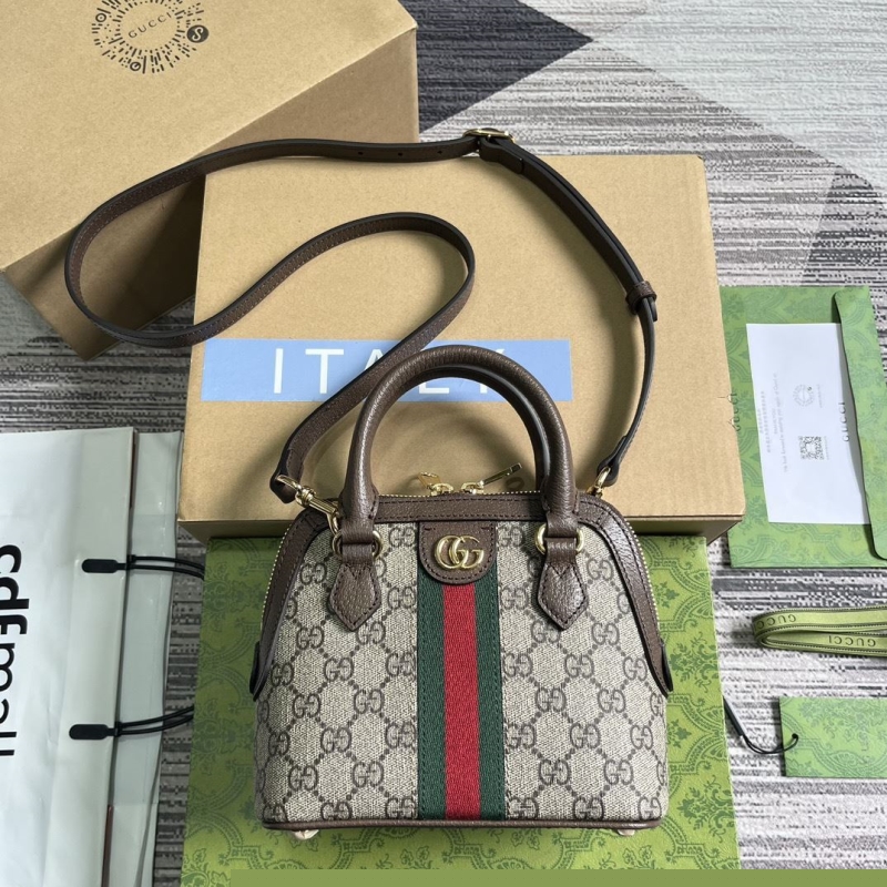 G*u*i top handle bags